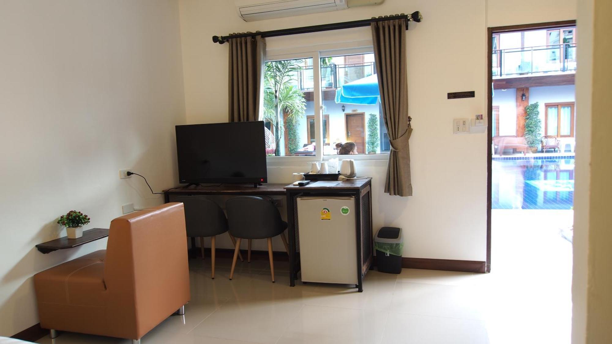 Paradise Land Resort Pattaya Quarto foto